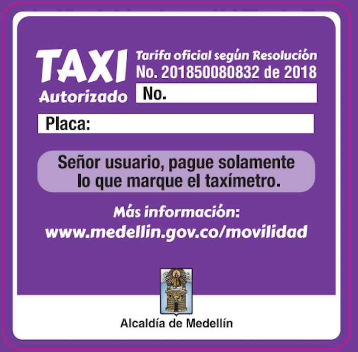 Medellín taxis can only charge new fares if they have a 2019 sticker in the window, above photos is the 2018 sticker, photo courtesy of Secretaría de Movilidad