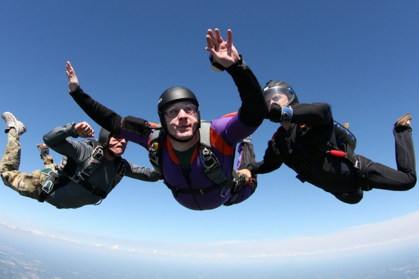 young man makes first jump towards skydiving certification